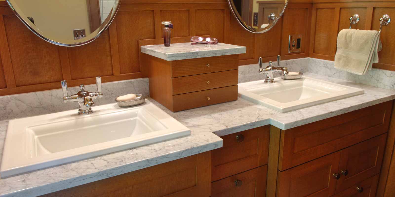 Victorian style bathroom remodel in Des Moines, Iowa by Silent Rivers Design+Build featuring double sink vanity and custom cabinets
