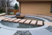 Impressive Water Feature Brings Modern Zen to a Front Entryway