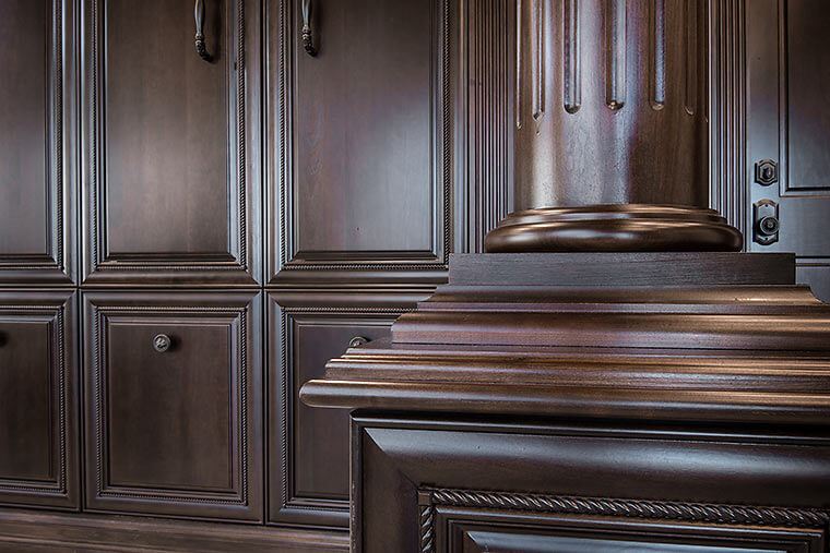 Woodwork, millwork and fluted columns detail in an Urbandale, Iowa master suite remodel by Silent Rivers shows the multiple layers and moldings requiring expert craftsmanship