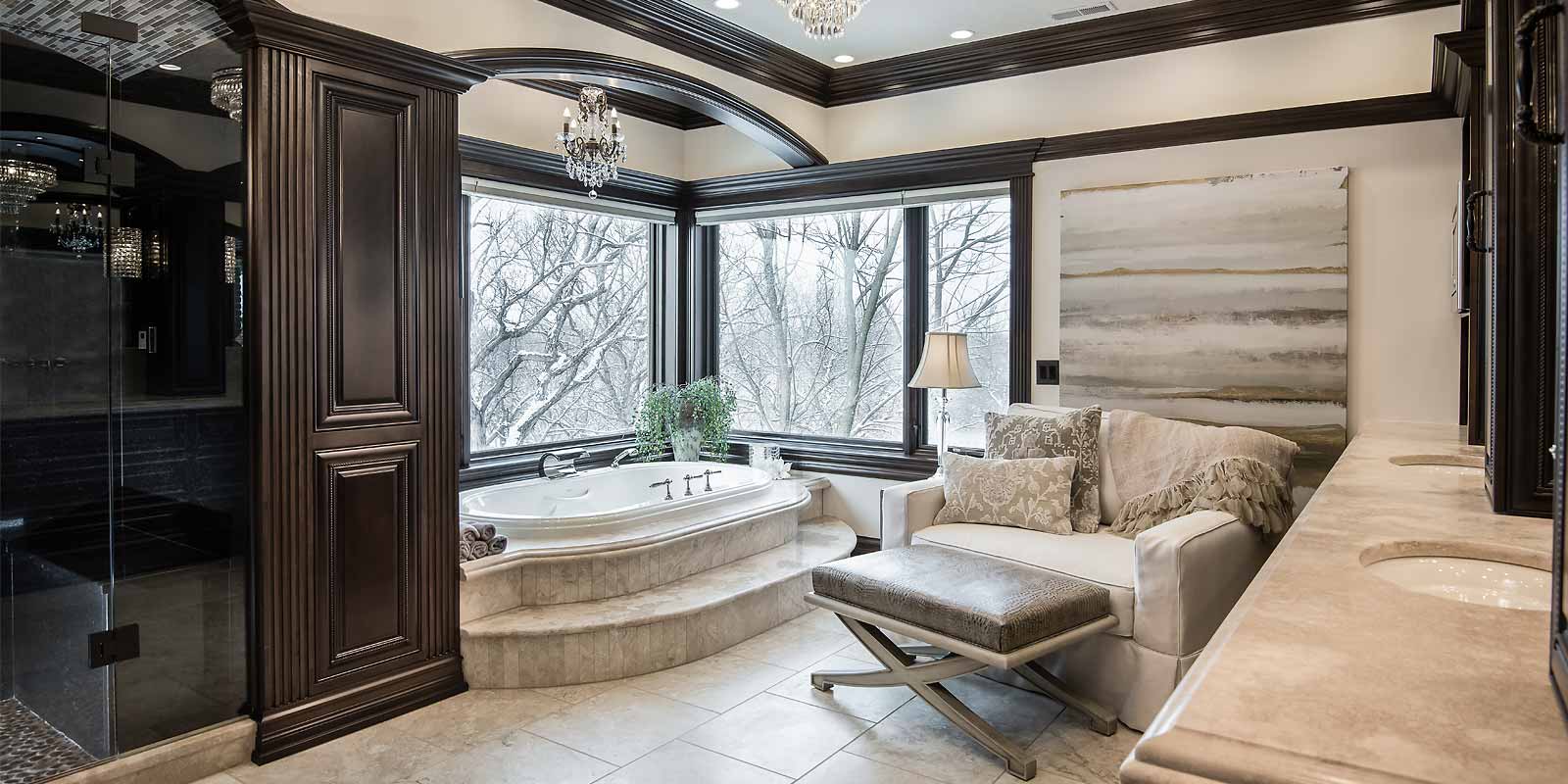 Elegant master suite bathroom remodel with ornate traditional moldings, arches, large soaking tub designed and built by Silent Rivers, Des Moines, Iowa