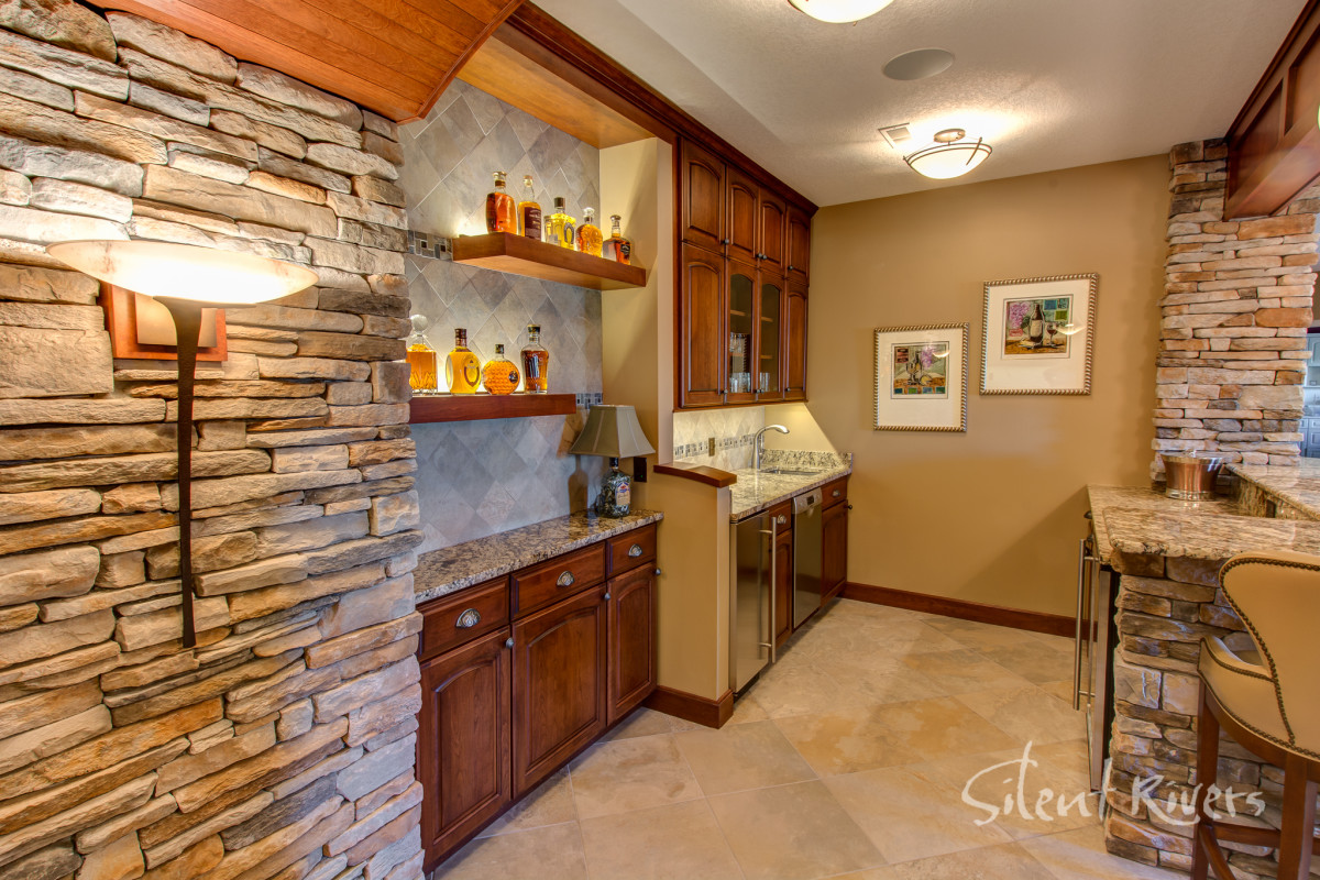 Wine Cellar and Home Theater in a Stunning Basement Remodel Silent Rivers Design+Build