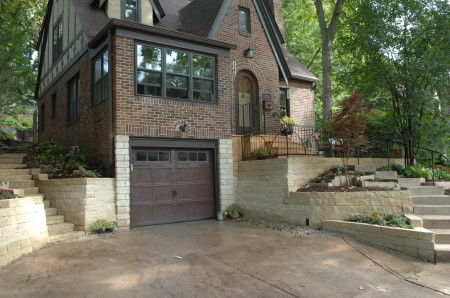 Beaverdale Curb Appeal Brick house with limestone retaining walls