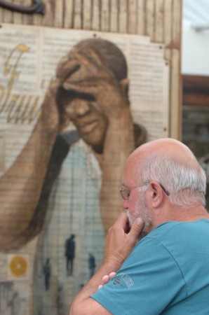 Summertime Contemplation: 2012 Des Moines Arts Festival attendee considers the work of visiting artist.
