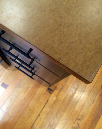 Paper composite countertops provide similar properties to solid surface while also being eco-friendly.