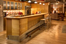 kitchen island with galvanized steel and raw wood with angled bar top
