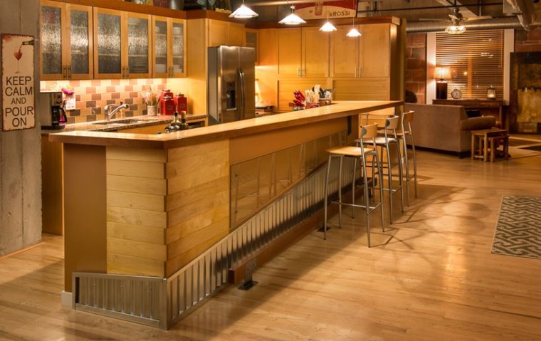 kitchen island with galvanized steel and raw wood with angled bar top