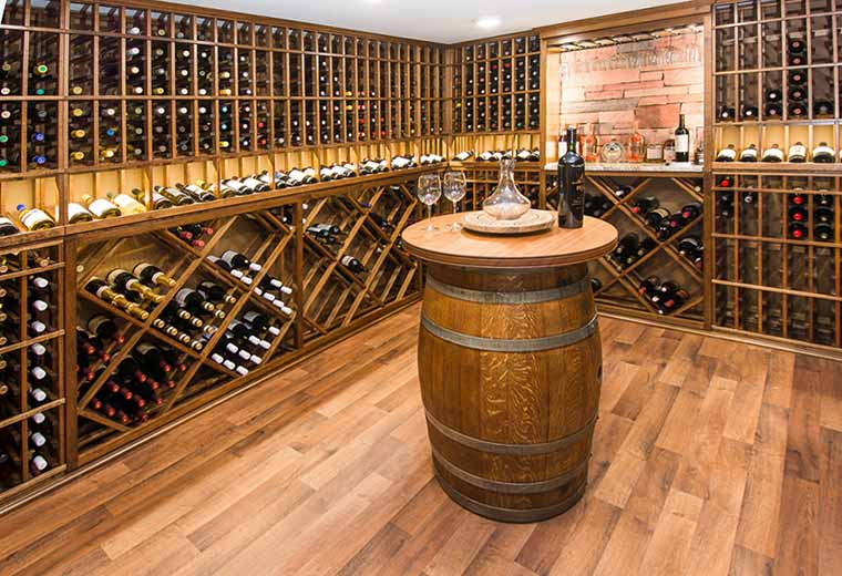 A basement remodel featuring a beautiful wine cellar