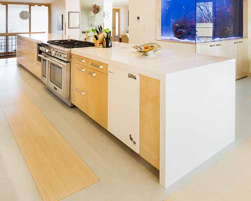 Old steel cabinets incorporated into a modern kitchen design by Silent Rivers Design+Build
