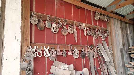 Old pulleys handing in an Iowa barn