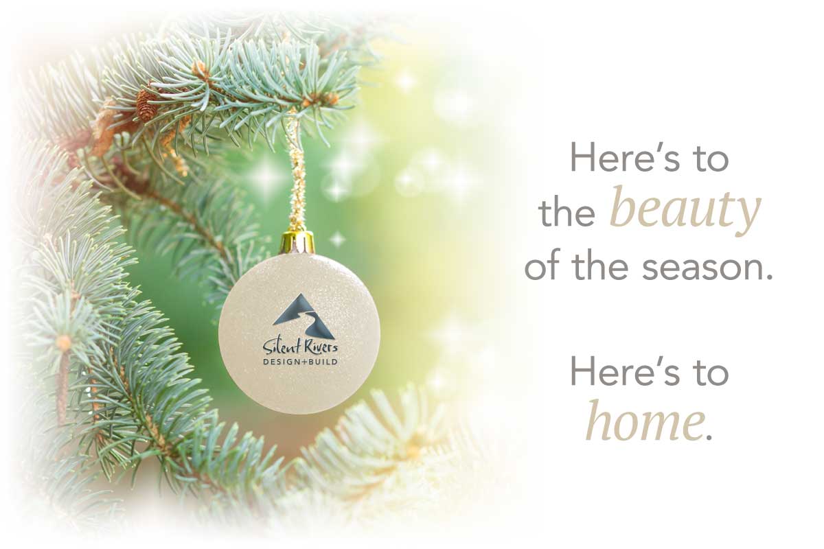 Silent Rivers holiday greetings ornament on tree, Here's to the beauty of the season, here's to home.