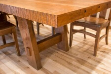 Detail of texture and cherry wood grain of custom designed table for 12 by Silent Rivers