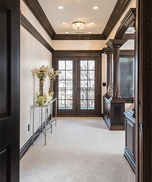 Grand entrance to an Urbandale master suite remodel by Silent Rivers features