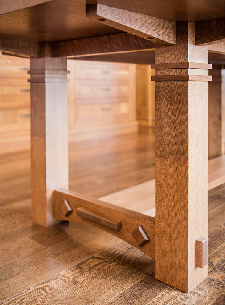 Quarter sawn white oak craftsman-style table base designed and built by Silent Rivers for a West Des Moines home they remodeled