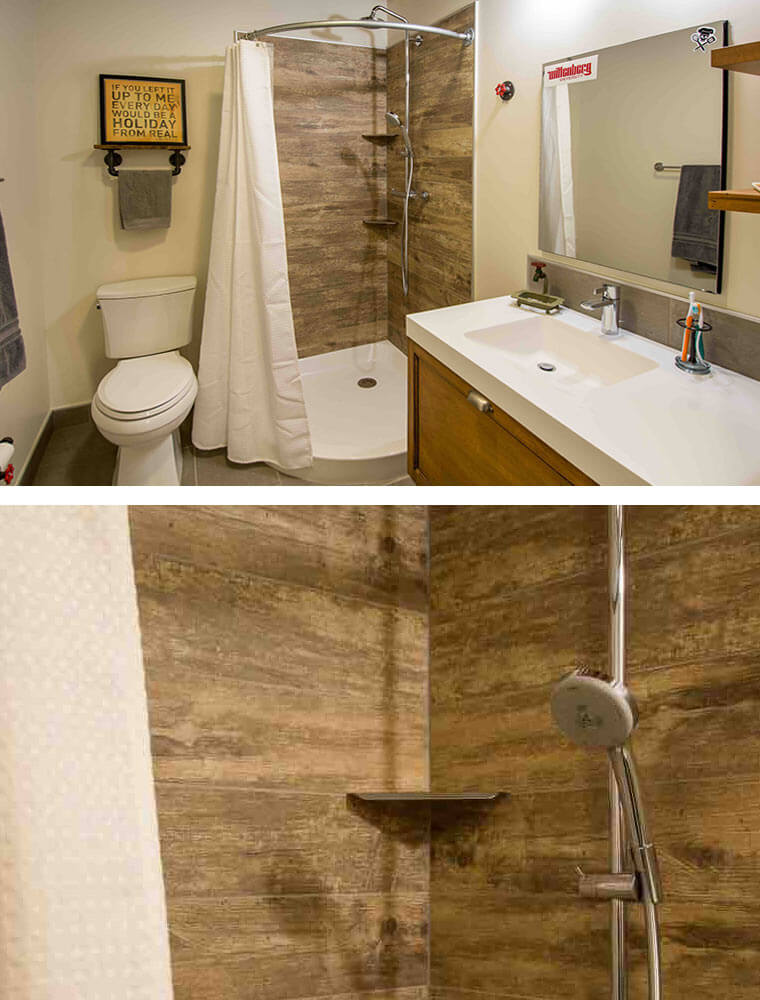 Industrial bathroom remodel in downtown Des Moines loft by Silent Rivers features weathered wood tile shower and concrete look tile floor