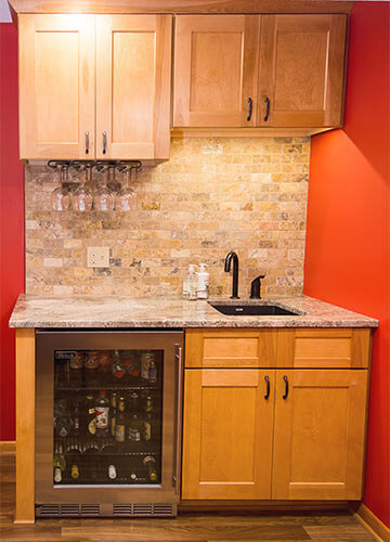 Wet bar in Des Moines home near wine cellar built by Silent Rivers