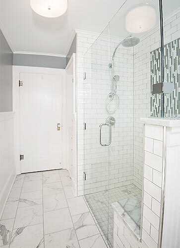 Des-Moines-craftsman-bathroom-by-Silent-Rivers with curbless glass shower