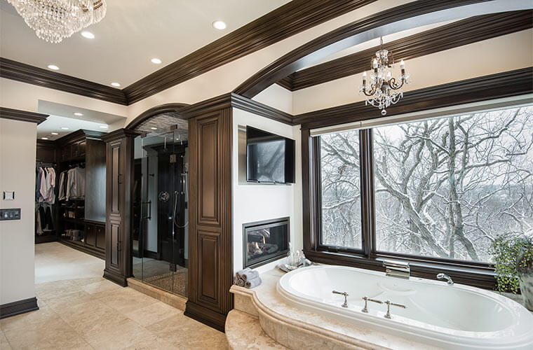 Urbandale-Iowa-luxurious-traditional-master-bathroom-by-Silent-Rivers with soaking tub