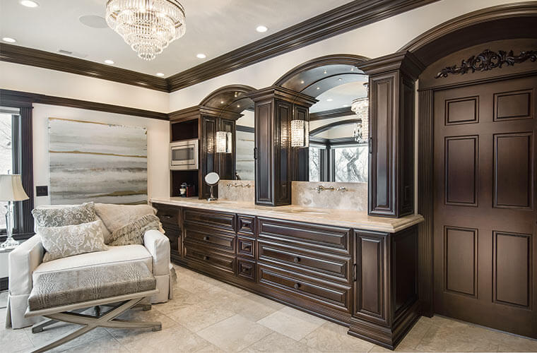 Urbandale-Iowa-luxurious-traditional-master-bedroom-by-Silent-Rivers with custom vanity cabinet and Tuscan pilasters