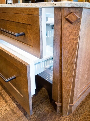 West Des Moines, Iowa craftsman kitchen remodel by Silent Rivers features custom paneled freezer drawer unit
