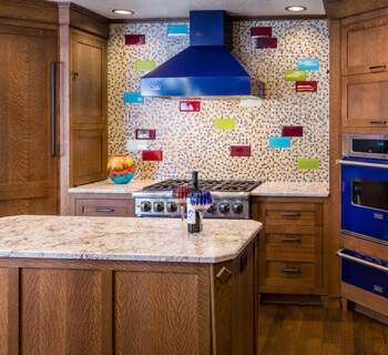 Custom White Oak Woodworking Completes a Colorful Craftsman Kitchen