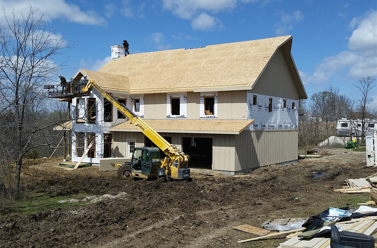 siding-and-roof-sheathing-new-home-designed-built-by-Silent-Rivers-in-Iowa