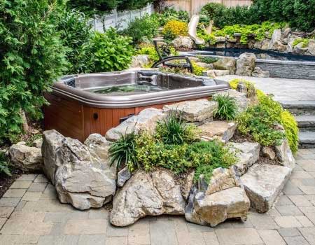 inspiration for above-ground spa for an outdoor landscaping project by Silent Rivers