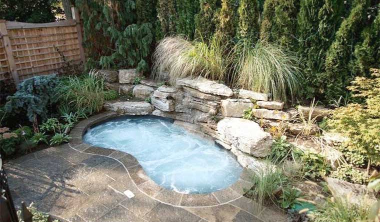 inspiration for in-ground spa with waterfall for a Silent Rivers outdoor project