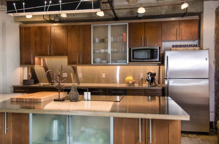 LED and row steel lighting in downtown Des Moines loft kitchen remodel by Silent Rivers