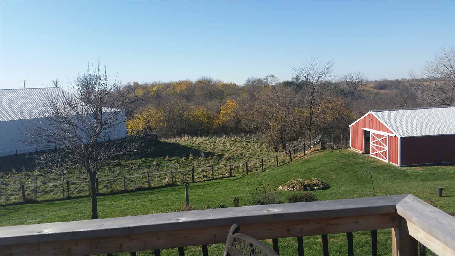 View of the farmland surrounding a house being remodeled by Silent Rivers of Des Moines