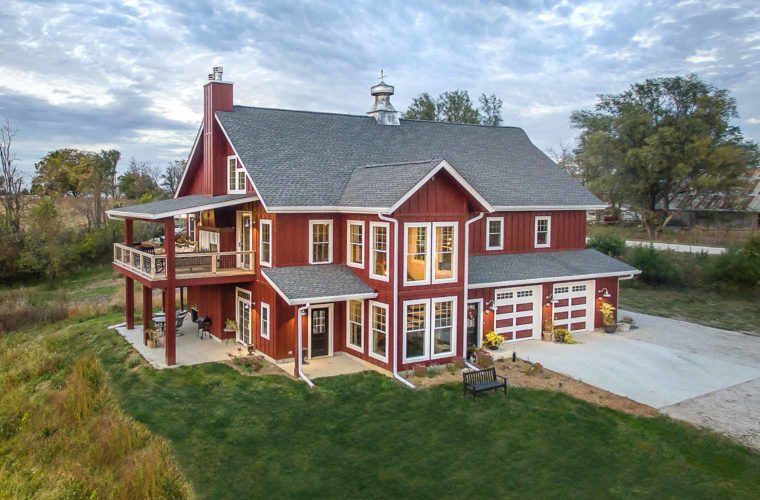 Custom new home in rural St Charles, Iowa designed and built by Silent Rivers of Des Moines is styled to look like a barn with a cupola