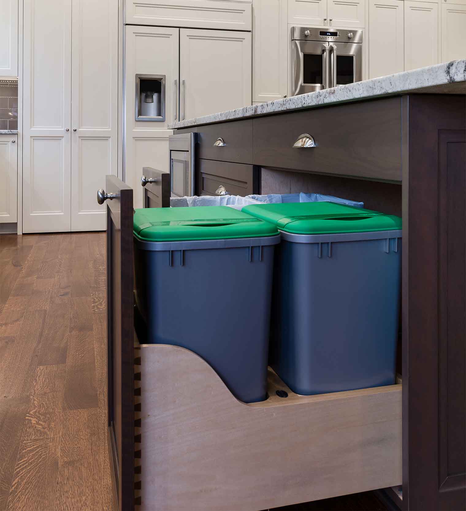 double trash and double recycling bins in pull-out kitchen cabinet in West Des Moines Clive kitchen remodeler Silent Rivers