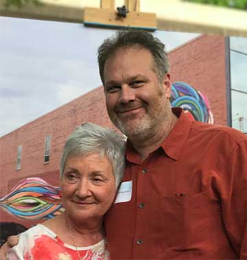 In 2017, Chaden was awarded the <a href=/silent-rivers-chaden-halfhill-g-david-hurd-innovator-of-the-arts-award/"<strong>G. David Hurd Innovator of the Arts award</strong></a> by the Des Moines Arts Festival. He is shown here with Trudy Holman Hurd, wife of the late G. David Hurd.

