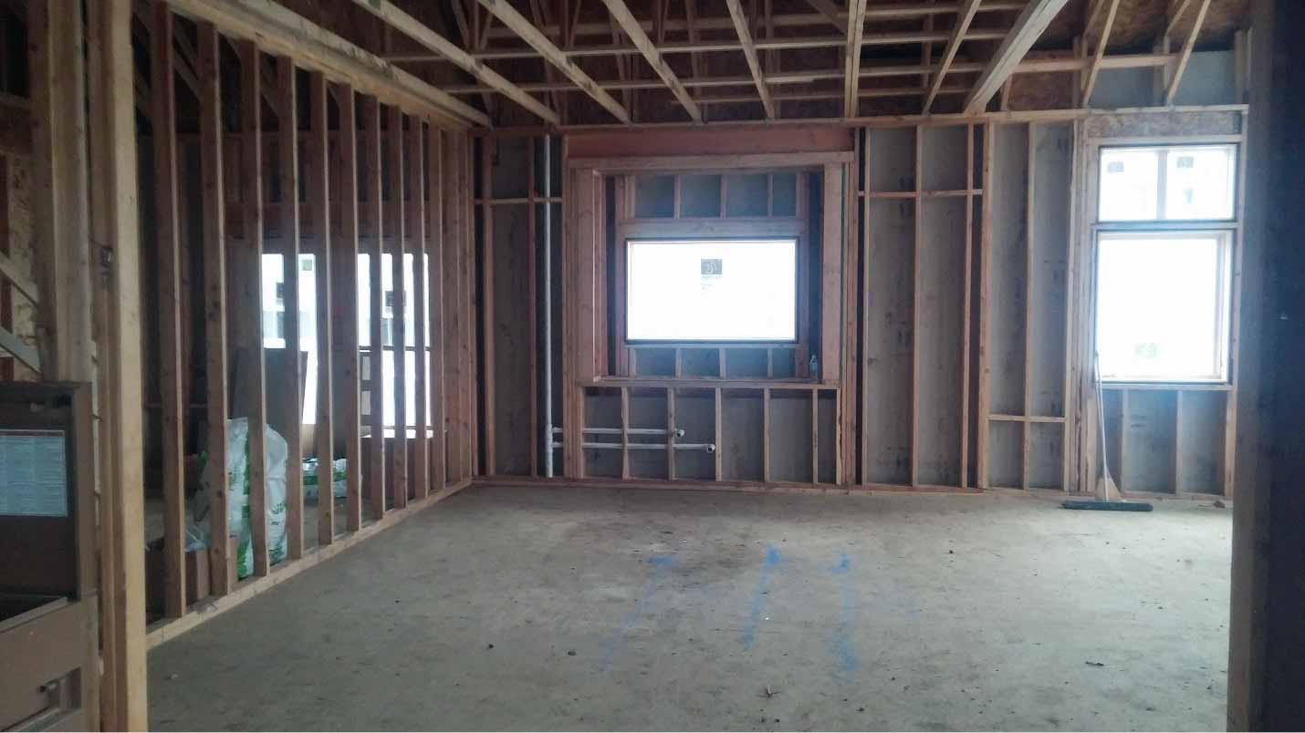 New custom home designed and being built by Silent Rivers of Des Moines, Iowa is framed and enclosed, in kitchen