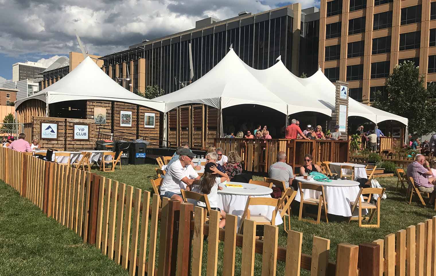 2017 Des Moines Arts Festival Silent Rivers VIP Club where Festival Patrons enjoy seated tables and a large tent
