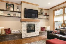 Family Room Remodel Gets New Stone Fireplace and Built-in Benches