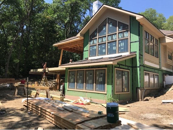 windows installed on custom new home exterior in Des Moines by designer builder Silent Rivers