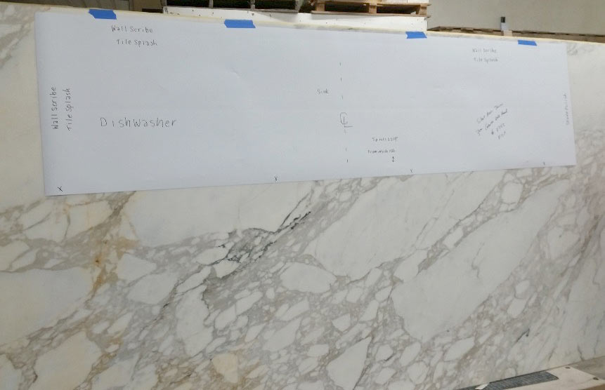 Calcutta gold marble countertop for kitchen addition to Des Moines Drake bungalow addition by Silent Rivers