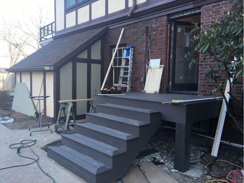 during exterior remodel of back entry and patio at Des Moines tudor house by designer remodeler Silent Rivers