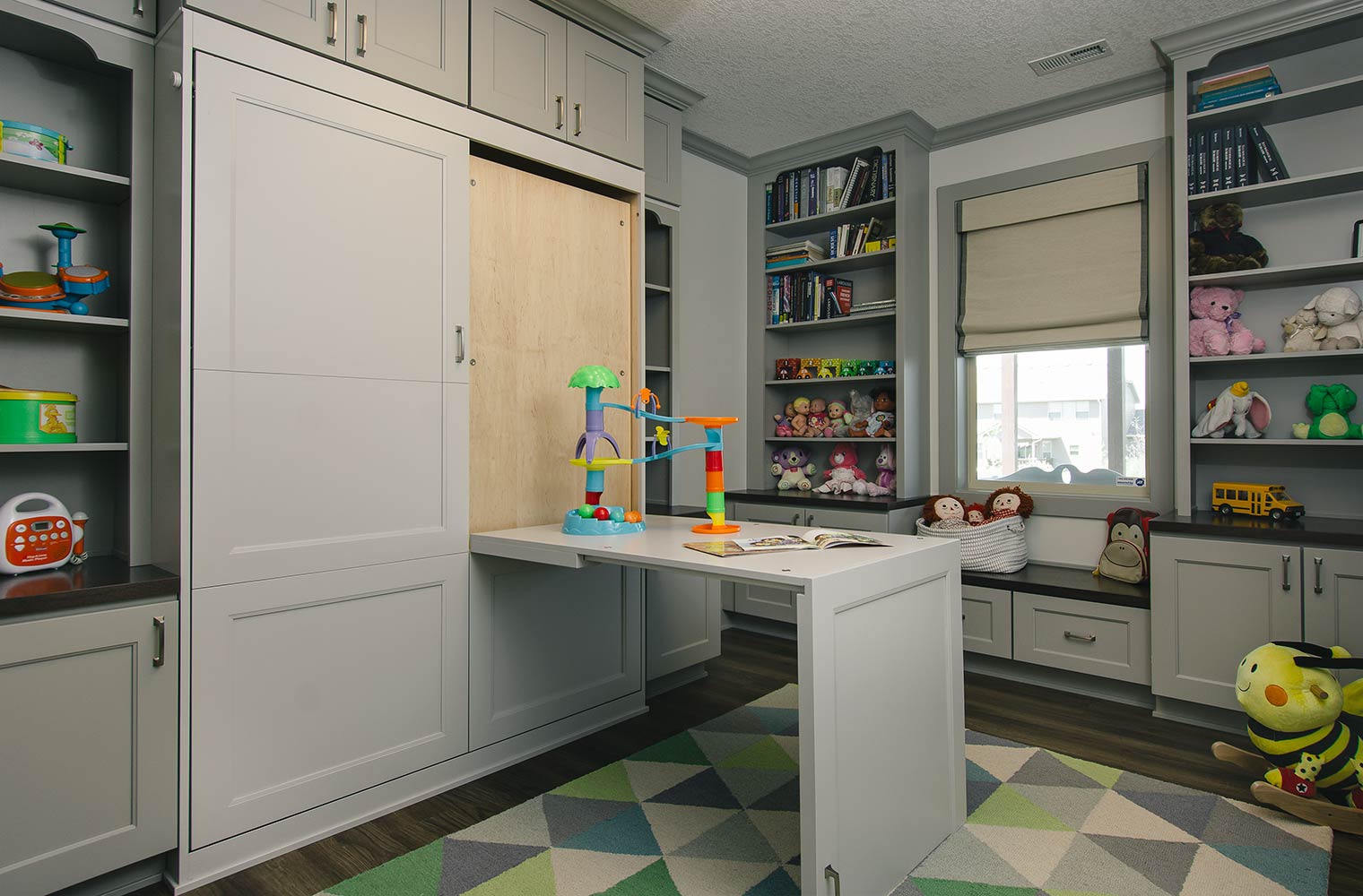 3-in-1 Murphy bed in desk position in a Clive, Iowa playroom, guest room, office by Silent Rivers