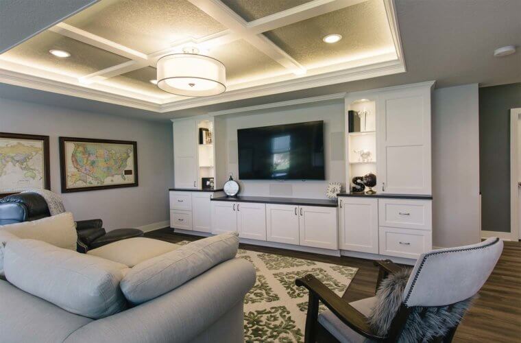 built-in entertainment center in Clive basement remodel by Silent Rivers