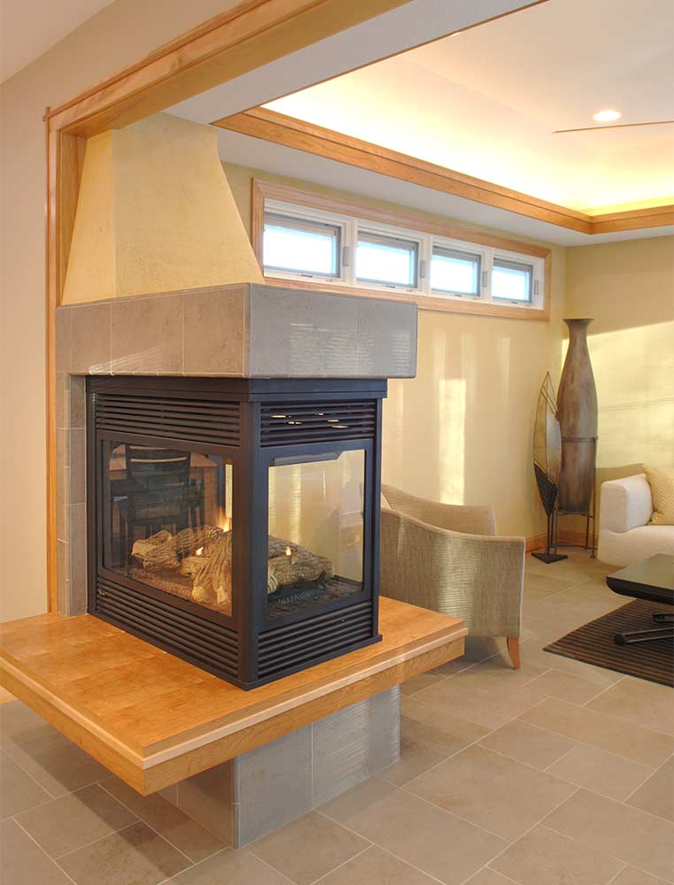 multi-sided see-through fireplace in Urbandale Iowa addition by Silent Rivers