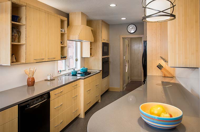 Contemporary kitchen remodel in Des Moines by Silent Rivers featuring bamboo custom cabinets