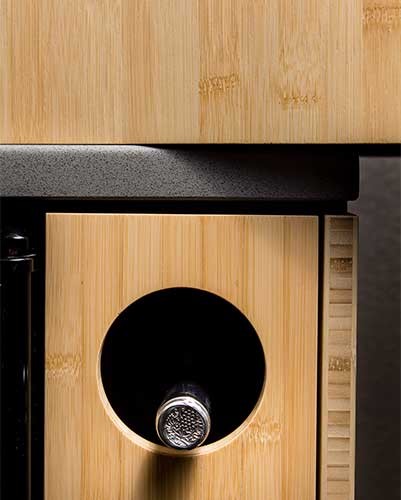 Custom wine storage in bamboo custom cabinets designed by Silent Rivers in Des Moines
