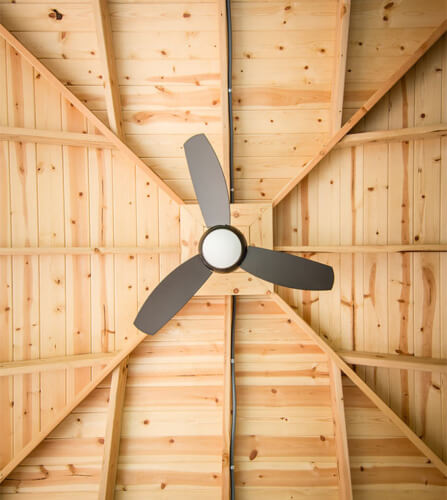 Des Moines, Iowa modern gazebo ceiling with exposed rafters and ceiling fan light, designed and built by Silent Rivers