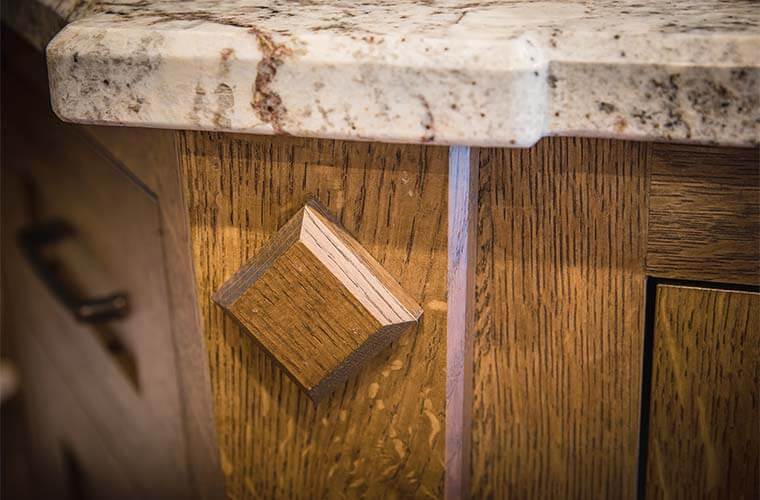 West Des Moines, Iowa craftsman kitchen remodel by Silent Rivers with custom cabinets in quartersawn white oak with diamond detail