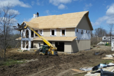 siding-and-roof-sheathing-new-home-designed-built-by-Silent-Rivers-in-Iowa