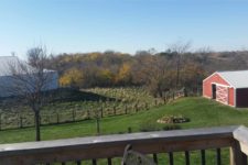 View of the farmland surrounding a house being remodeled by Silent Rivers of Des Moines