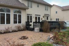 Before photo of outdoor patio space needing a new design by Silent Rivers, Des Moines