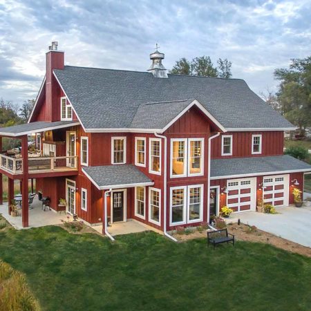 Custom new home in rural St Charles, Iowa designed and built by Silent Rivers of Des Moines is styled to look like a barn with a cupola