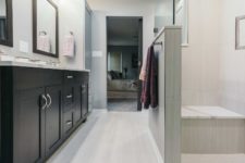 Zero entry shower custom double vanity in contemporary bathroom designed and built by remodeler Silent Rivers Design+Build, Des Moines, Iowa